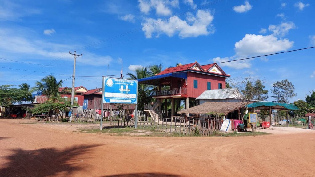 A crossroads in Sroeung commune's Phum Thmey village with a Cambodia People's Party billboard in Kampong Thom province on November 30, 2022. (Danielle Keeton-Olsen/VOD)