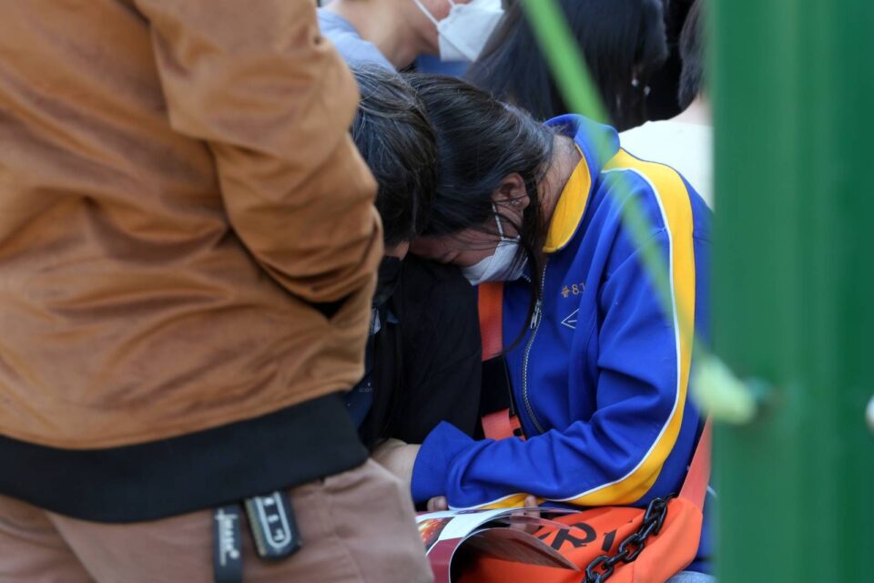 A student cries after the national exam results are posted at Phnom Penh's Sisowath High School on December 22, 2022. (Hean Rangsey/VOD)