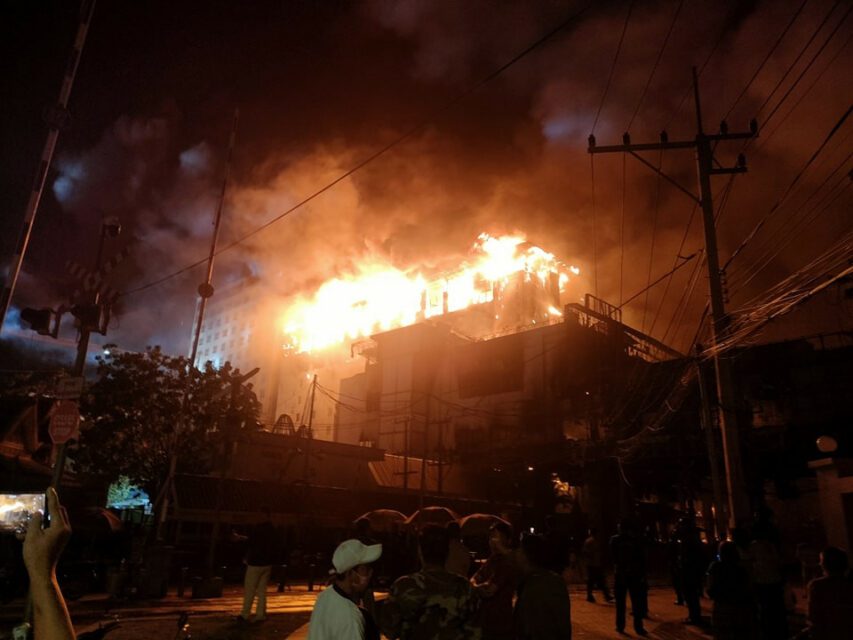 A huge fire engulfs the Grand Diamond City Casino in Poipet city on December 29, 2022. (Banteay Meanchey Provincial Police Facebook page)