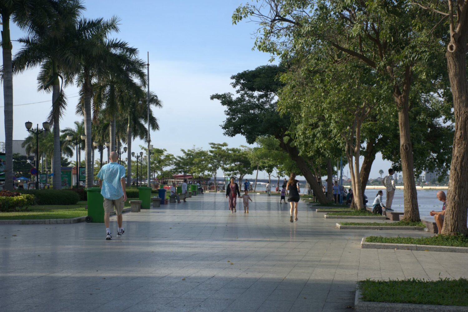 People exercise on the boardwalk at the Phnom Penh riverside in 2022. (Chanrith Natvathnak/Future Forum)