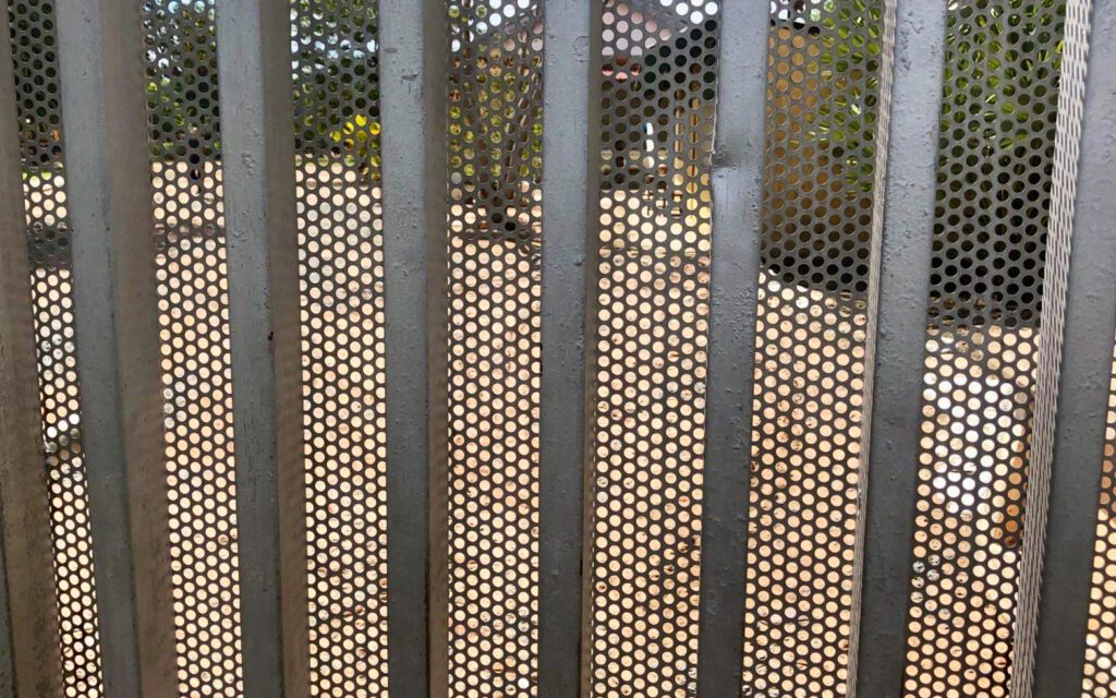 Meshed bars block the entrance to the Prey Speu center. (Ananth Baliga/VOD)