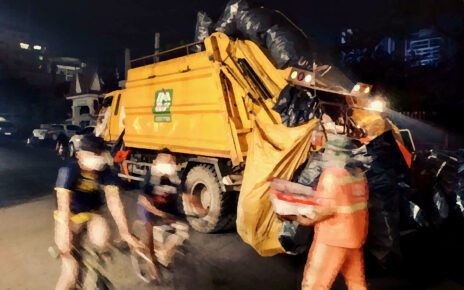 Cintri workers collect trash in Phnom Penh's Boeng Keng Kang I commune. (Michael Dickison/VOD)