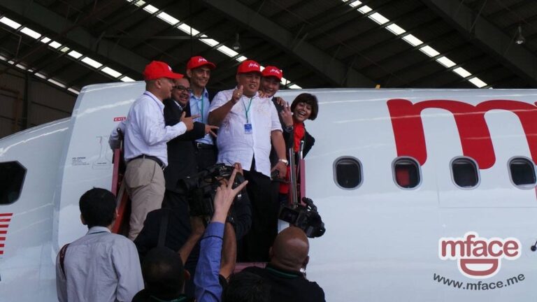 Teddy Teow Wooi Huat arrives for a signing event between his company MFace and low-case air carrier AirAsia, in a photo posted to MFace's Facebook page on June 11, 2013.