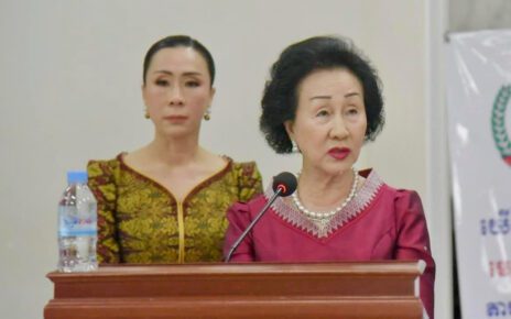 Notorious tycoon Choeung Sopheap and her daughter Choeung Sokuntheavy, in the background, at the Ministry of Health in June 2022. (Ministry of Health's Facebook)